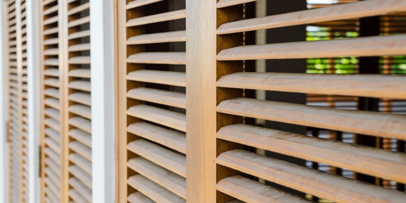 Can T Agree With Your Partner On Drapes Try Wooden Shutters